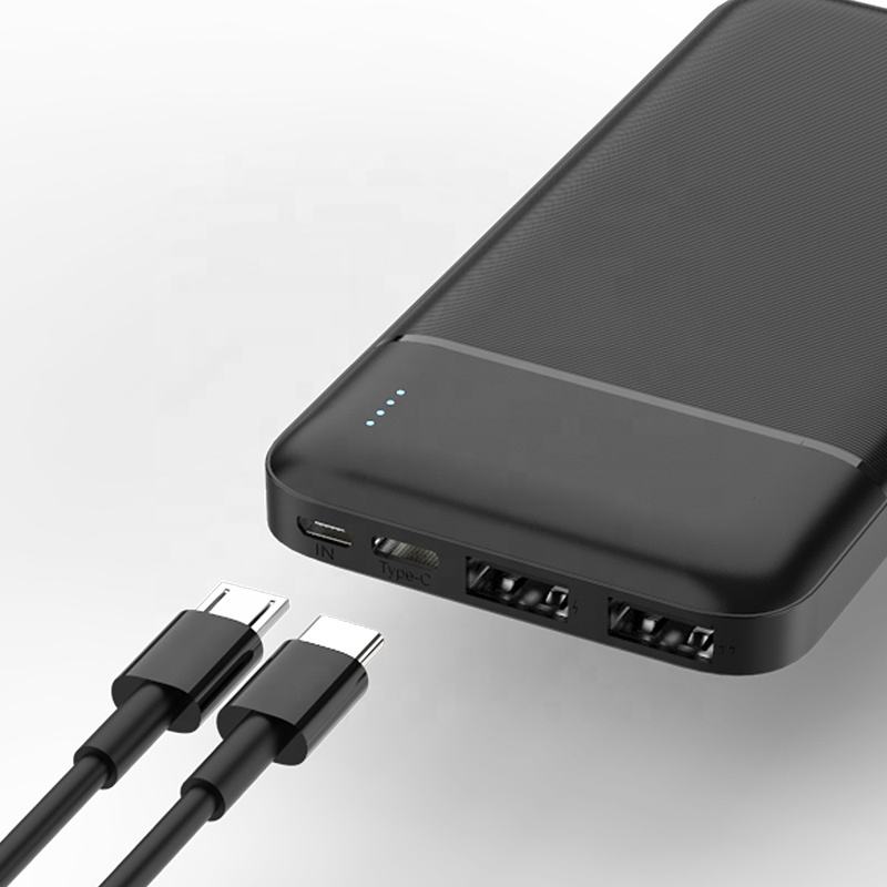 Black portable power bank with dual USB outputs