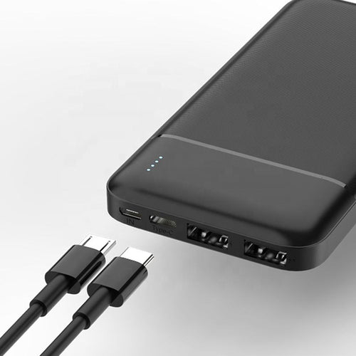 Black portable power bank with dual USB outputs
